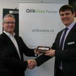 Adrian presenting gift to David Telford of QlikTech